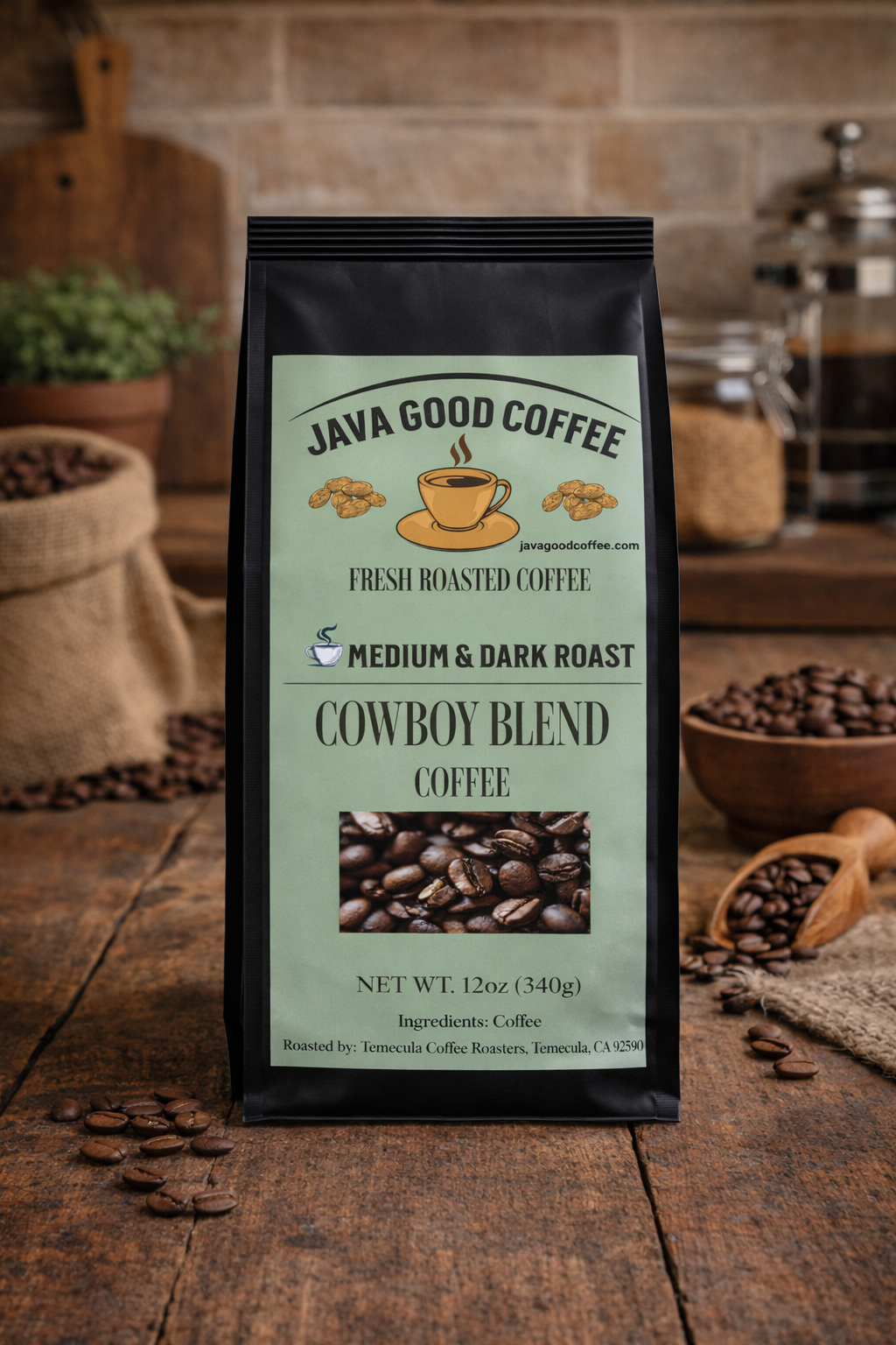 Java Good Coffee Cowboy Blend package on a wooden surface with coffee beans and a rustic background.