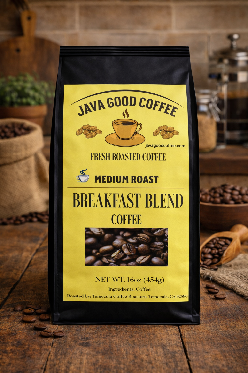 Java Good Coffee Breakfast Blend coffee bag on a wooden surface with coffee beans and a coffee grinder in the background.