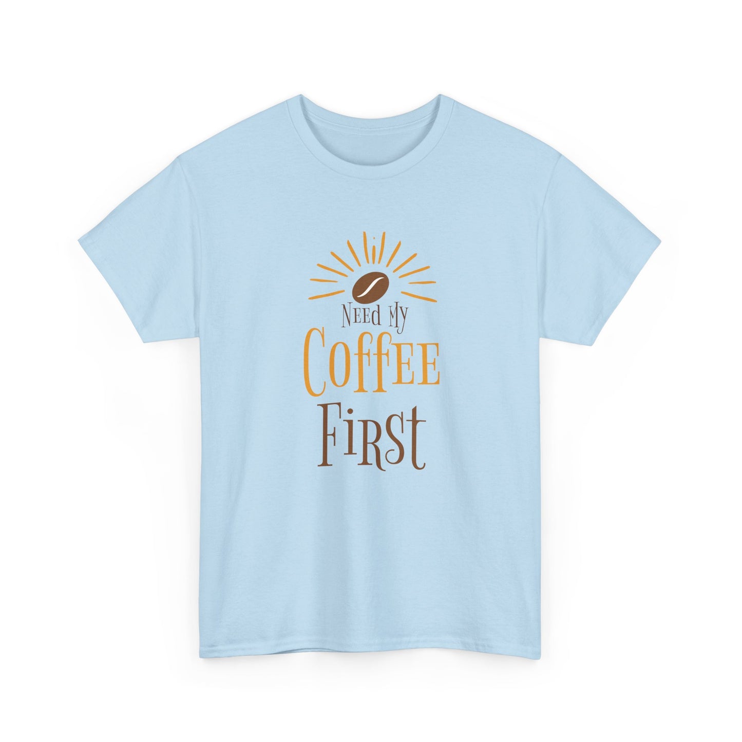 Light blue t-shirt with 'Need My Coffee First' text and coffee bean graphic on a white background