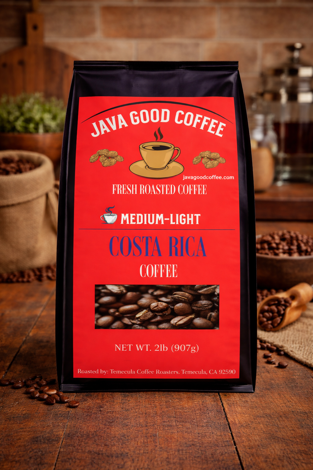 Java Good Coffee package on a wooden surface with coffee beans and a brick wall background