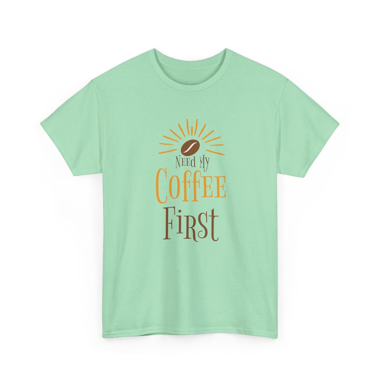 Mint green t-shirt with 'Need My Coffee First' text and sun graphic on a white background