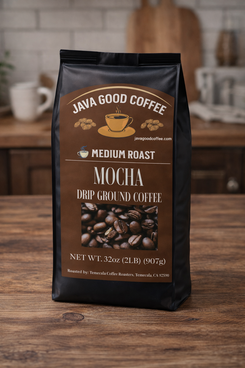 Java Good Coffee Mocha drip ground coffee package on a wooden surface with a kitchen background.