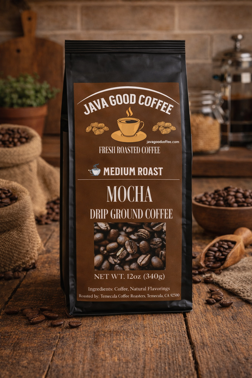 Java Good Coffee Mocha drip ground coffee package on a wooden surface with coffee beans and a coffee grinder.